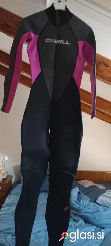 Neopren zenska obleka cela malo rabljena