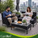 4 delna vrtna sedežna garnitura ratan z blazinami črna + steklena miza