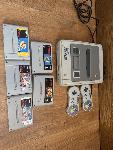 SNES + 2 daljinca + 5 iger (2 redkejsi)