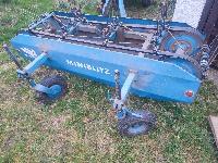 Traktorski tračni obračalnik