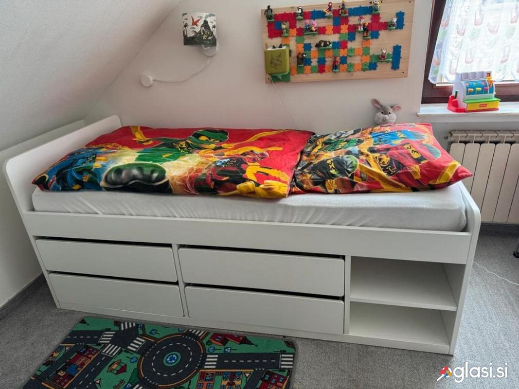 Prodam otroško posteljo IKEA 90x200 z vzmetnico in predali